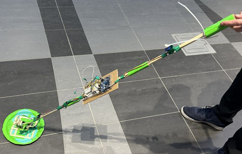 Arduino-based smart cane prototype with its sensors and tactile feedback mechanism